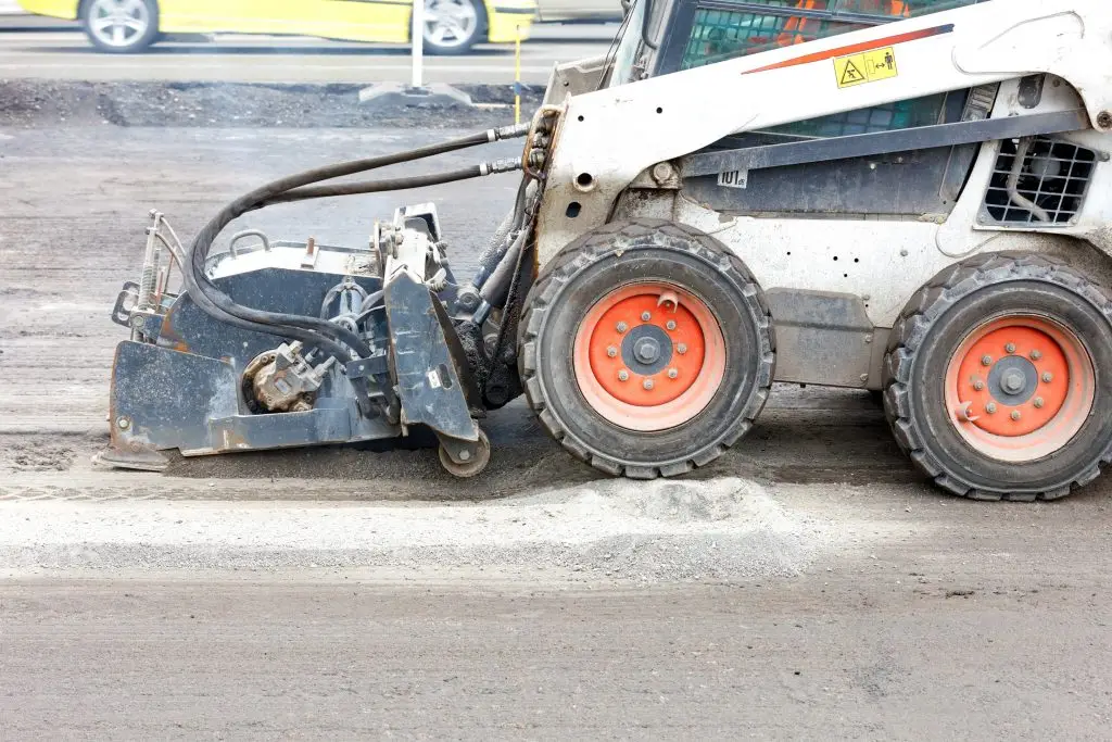 bobcat rental with surface repair attachment