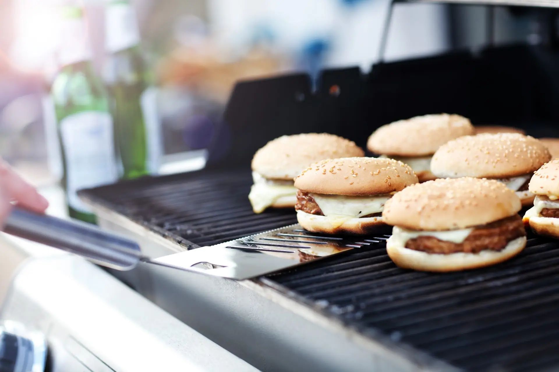 cheeseburgers on the grill